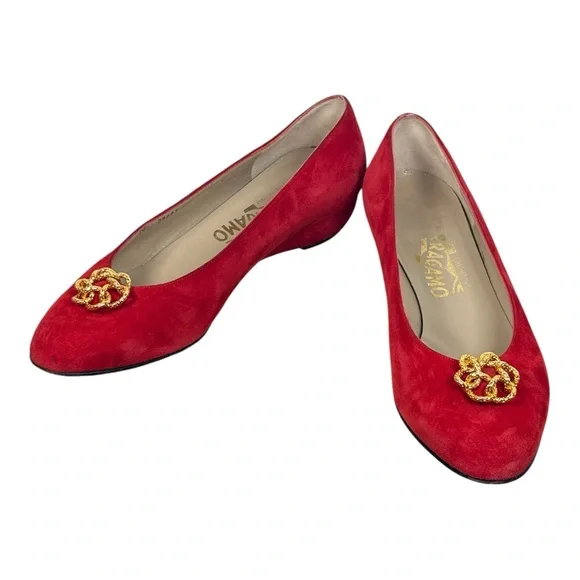 Salvatore Ferragamo red suede pumps featuring a gold-toned ornamental buckle